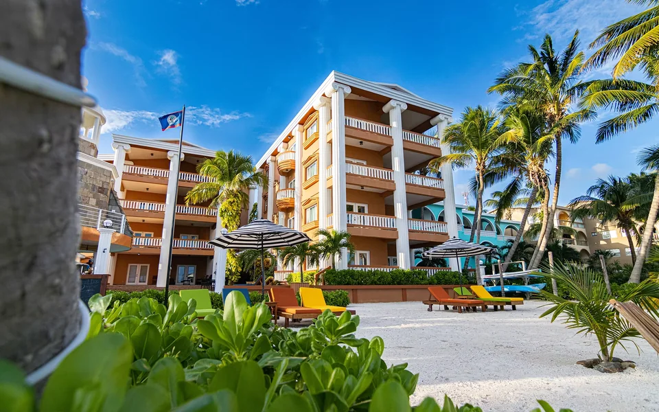 Beachfront villas and palms at Lighthouse Beach Villas