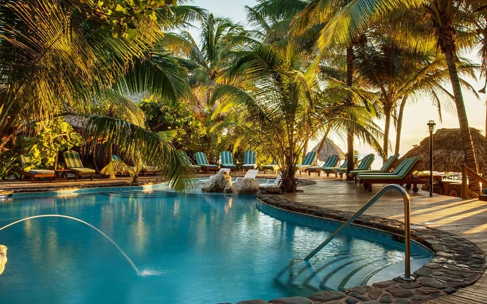 Pool and tropical palms at Xanadu Island Resort